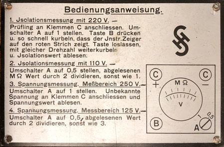 Operation manual inside the cover of the antique siemens and halske insulation meter