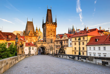 Best things to do - Prague, Czech Republic. Charles Bridge with its statuette, Lesser Town Bridge Tower and the tower of the Judith Bridge. Copyright Emi Cristea