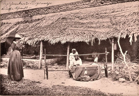 Zanzibar 1888 Weaving with a loom. The lady is a German.