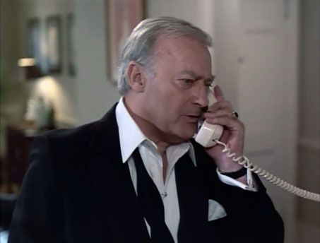 Edward Woodward in The Equalizer - Robert McCall has just returned home when he answers a call from a prospective client who knows too much about a case of political blackmail in "The Last Campaign"