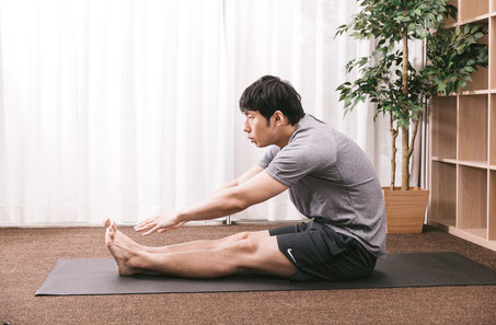 前屈で腰痛が悪化した奈良県香芝市の男性