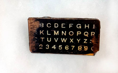 Alphabet board brooch