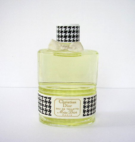 MISS DIOR - 1ère VERSION : EAU DE TOILETTE - NOEUD EN SATIN  BLANC AUTOUR DU COL -  BOUCHON BAKELITE MOTIFS PIED-DE-COQ