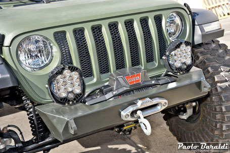 The front bumper made by EVO Manufacturing houses the Warn Zeon Platinum 10-S winch and the LED headlights of Baja Designs