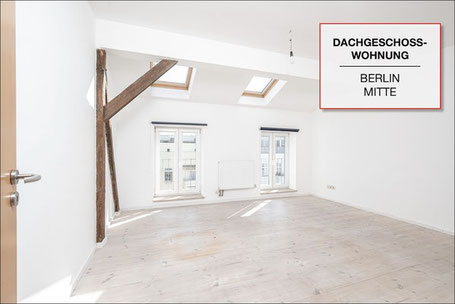 Verkaufte Dachgeschosswohnung in Berlin-Mitte mit hellem Wohnraum, Dachfenstern und freiliegendem Holzbalken