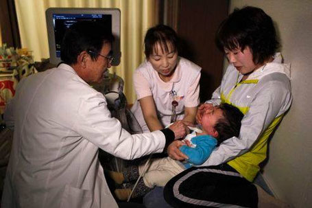 Échographie de la thyroïde d'un enfant, à 50 km de la centrale de Fukushima (source : REUTERS°