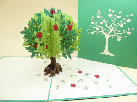 Carte pop-up arbre pommier avec ses feuilles vertes et ses pommes rouges