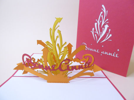 carte pop-up bonne année orange jaune et rouge
