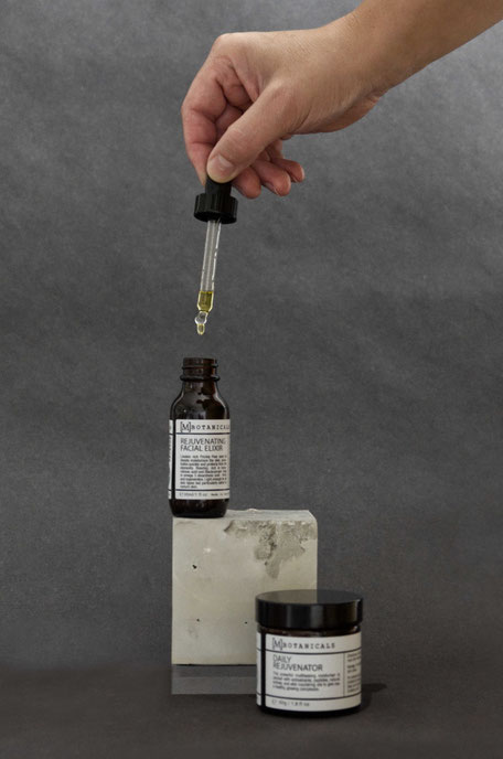 Styled product photography by PASiNGA with concrete cube prop for MBotanicals skincare