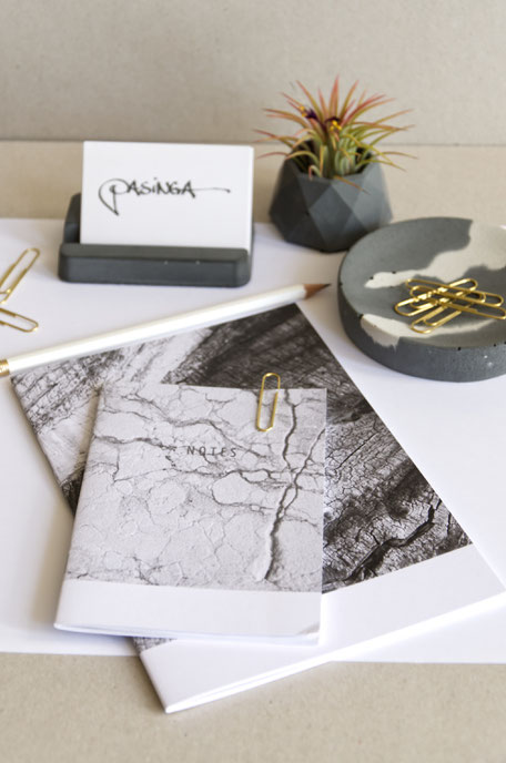 Concrete desk accent and recycled paper pocket notebooks by PASiNGA design