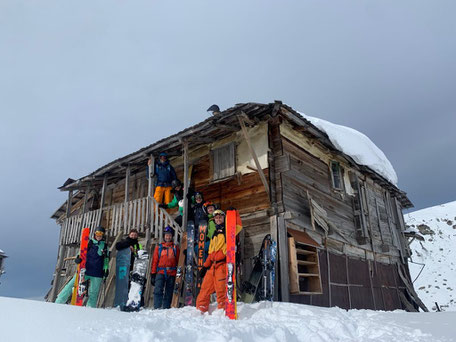 The first group in December 2019/January 2020 - great freeriders and most of them repeaters... (in front of a random hut, but not our hut)