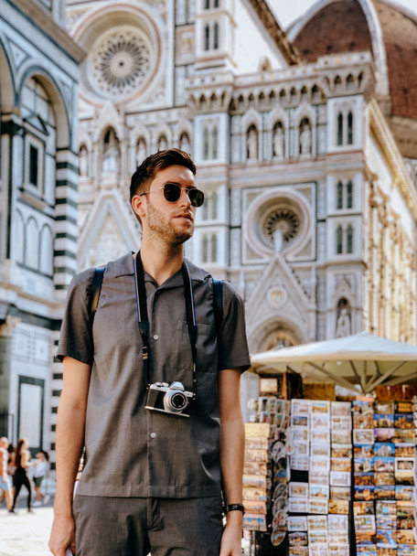 Thomas posing in front of the Duomo