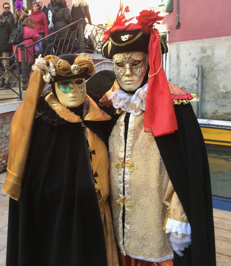 A couple disguised in Venice