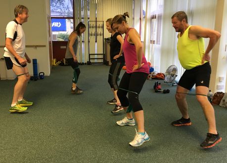 Band walks to activate the hips and gluteus