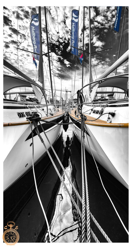 Waves against a fantastic sunsetSailboat in black white against a strong sky, Color Touch Effects