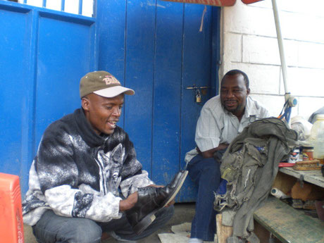 a shoeshiner in Tanzania