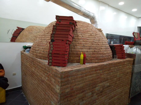four à pizza au bois professionnel