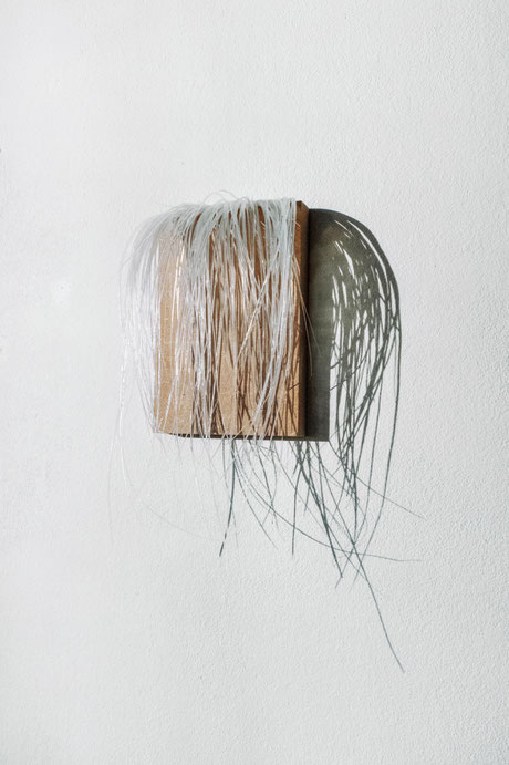 silverliner, wall object, white silicone on MDF nature, 12 x 18 cm, 2021
