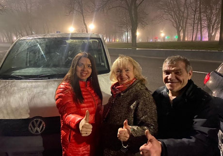 The van arrives in Chernihiv, Ukraine: Yullia Zayaka, Victoria Filatova, and the volunteer driver. 