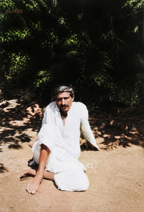 1922 : Poona, India. Meher Baba relaxing outside his thatched hut. Image rendition by Anthony Zois. BP