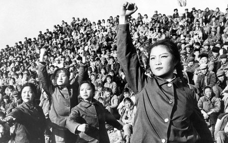 Chinese women raising their fist. From David Serrano via Pinterest. 