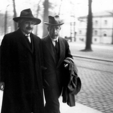 Black and white picture of Niels Bohr and Albert Einstein taken by Paul Ehrenfest  at the 1930 Solvay Conference in Brussels