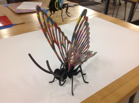 Giant insects created on the laser then assembled and painted.