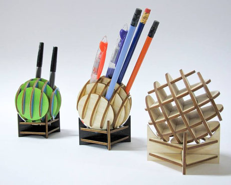 Desk widgets repurposed as pencil holders.