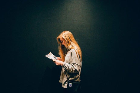 woman reading a magazine