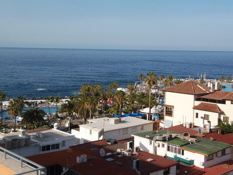 Bild mit Ansicht der Wohnung auf das Meer und Link zur weiteren Beschreibung der Immobilie.
