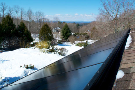 Distant Hill Gardens 3.15 kW roof mounted Photovoltaic Array using SunPower Signature™ black solar panels.