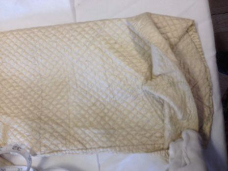 C18th quilted bedgown, showing cuff construction. BATMC 97.18 (loan)