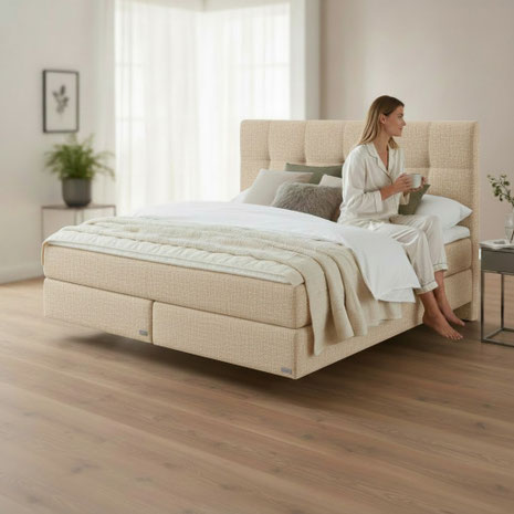 Wie lange hält ein Boxspringbett? FAQ mit Tipps zu Matratze, Topper und Unterbau, plus Wikipedia-Infos zur Taschenfederkernmatratze.