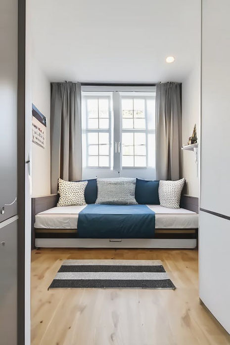 Kombiniertes Wohn-Schlafzimmer clever einrichten: Entdecken Sie 10 inspirierende Tipps und Beispiele für mehr Platz, Komfort und stilvolles Wohnen auf kleinem Raum.