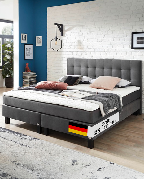 Graues Boxspringbett überzeugt durch zeitloses Design, Komfort und flexible Konfiguration bei Boxspringbettenshop24.de. Für stilvolle Schlafzimmer 2025.