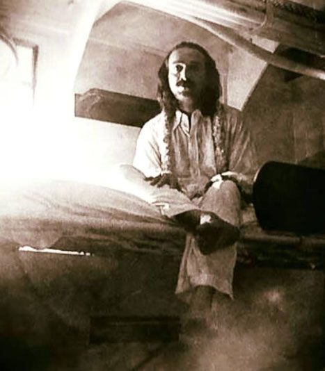 The picture of Meher Baba in his cabin, ship and date unknown.