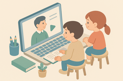 動画でプレゼン資料の作り方を学習する小学生の男女