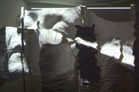 projection onto cotton soaked in plaster, w300 x h200 x d200 cm