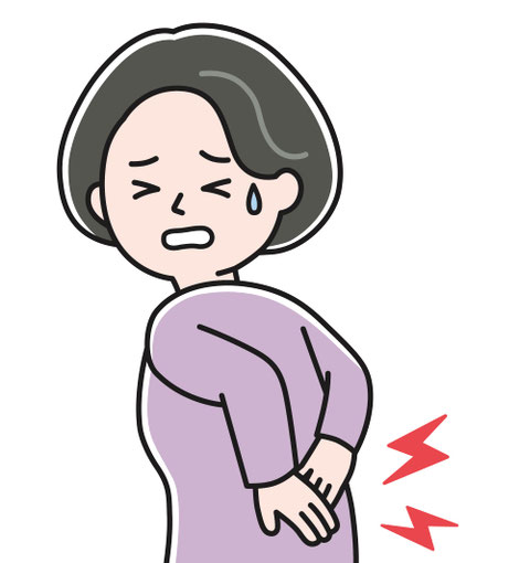 腰痛に悩む女性