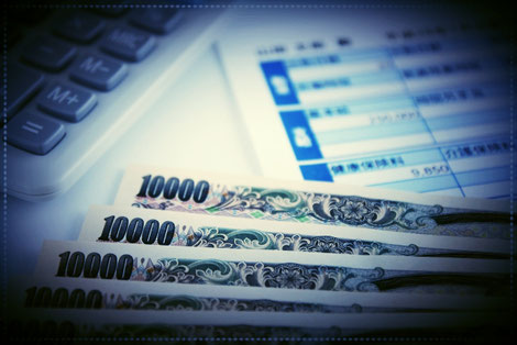 給料明細とお金の画像