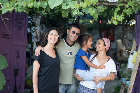 Sinam, Murat, Mavi and Sirma in front of Hobbit House