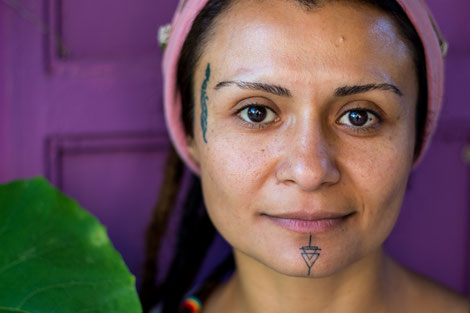 Sirma with her two facial tattoos