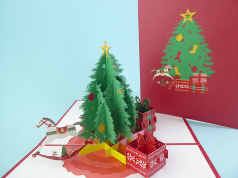 Carte pop-up sapin de noël décoré entouré de cadeaux