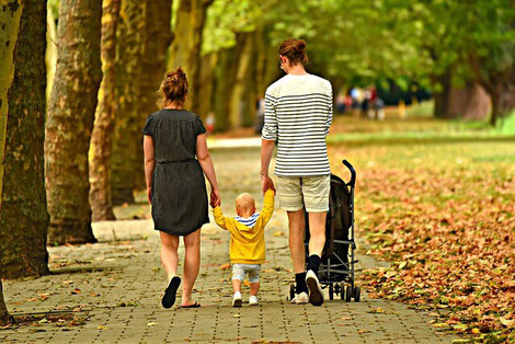 Family holding hands.