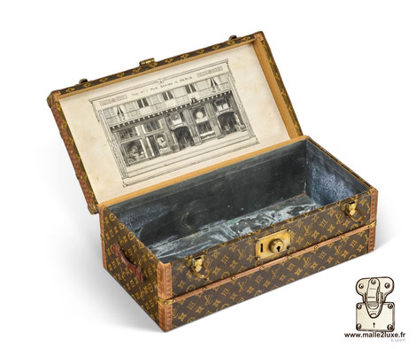record prix malle cabine a fleurs Louis Vuitton en salle des vente vintage mauvais etat