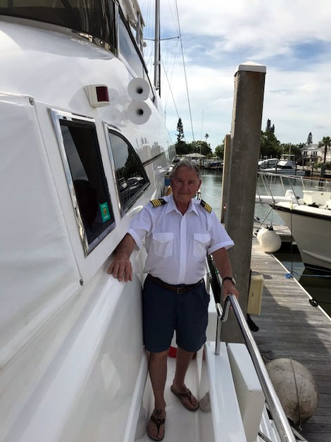 Master Captain Jack Jones image standing on a 45 foot power boat