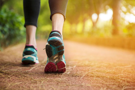 Woman wearing running shoes at a park