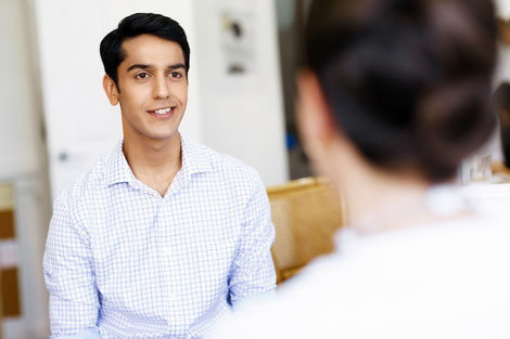 A Levitise Nutrition and Lifestyle Coach helping a client achieve his weight management goals