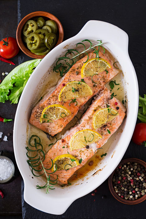 Baked salmon fillet with rosemary, lemon and honey. Top view