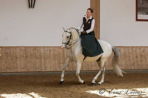 Vera Munderloh and Lusitano stallion "Super" in a side saddle